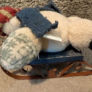 Cozy Cream and Blue Plush Bear on Sled